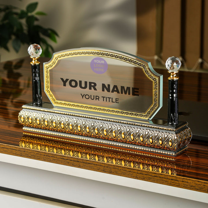 Decorative nameplate with customizable text on a wooden surface