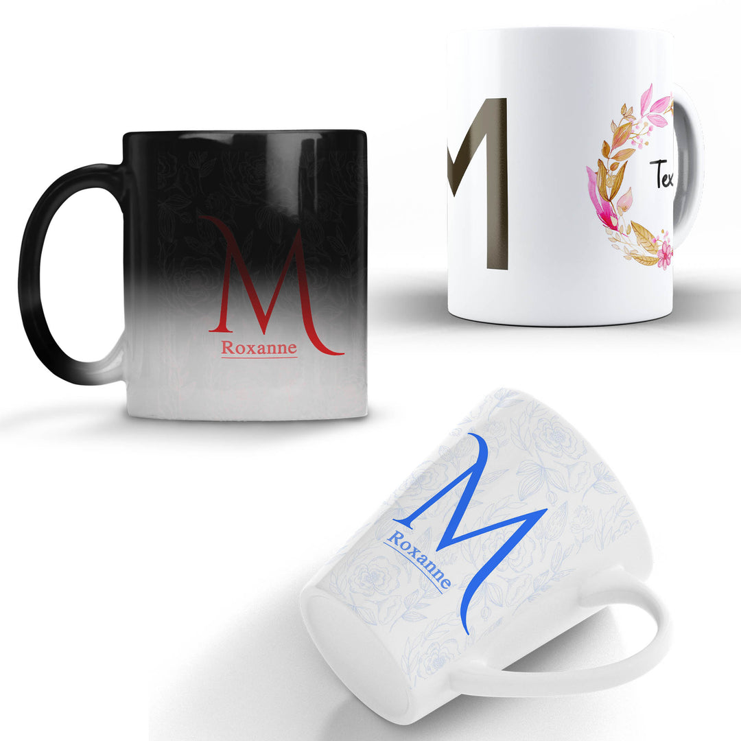 Three mugs with personalized designs and names on a white background