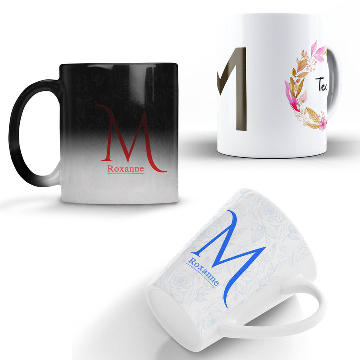 Three mugs with personalized designs and names on a white background