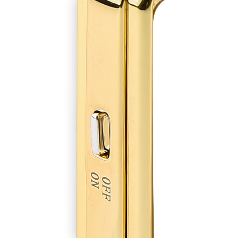Gold lighter with 'ON' and 'OFF' labels on a white background