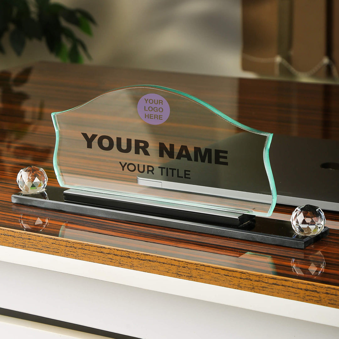 Personalized nameplate on a wooden surface with a blurred background